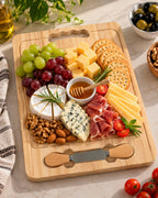 Wooden cheese serving board with charcuterie