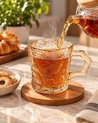 Amber textured glass mug with tea