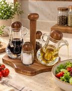 Dark wood glass oil vinegar and spice condiment set in kitchen scene