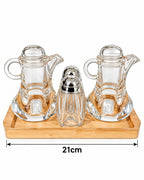Glass oil vinegar and spice condiment set on 21 cm bamboo tray