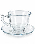 Clear glass tea cup and saucer