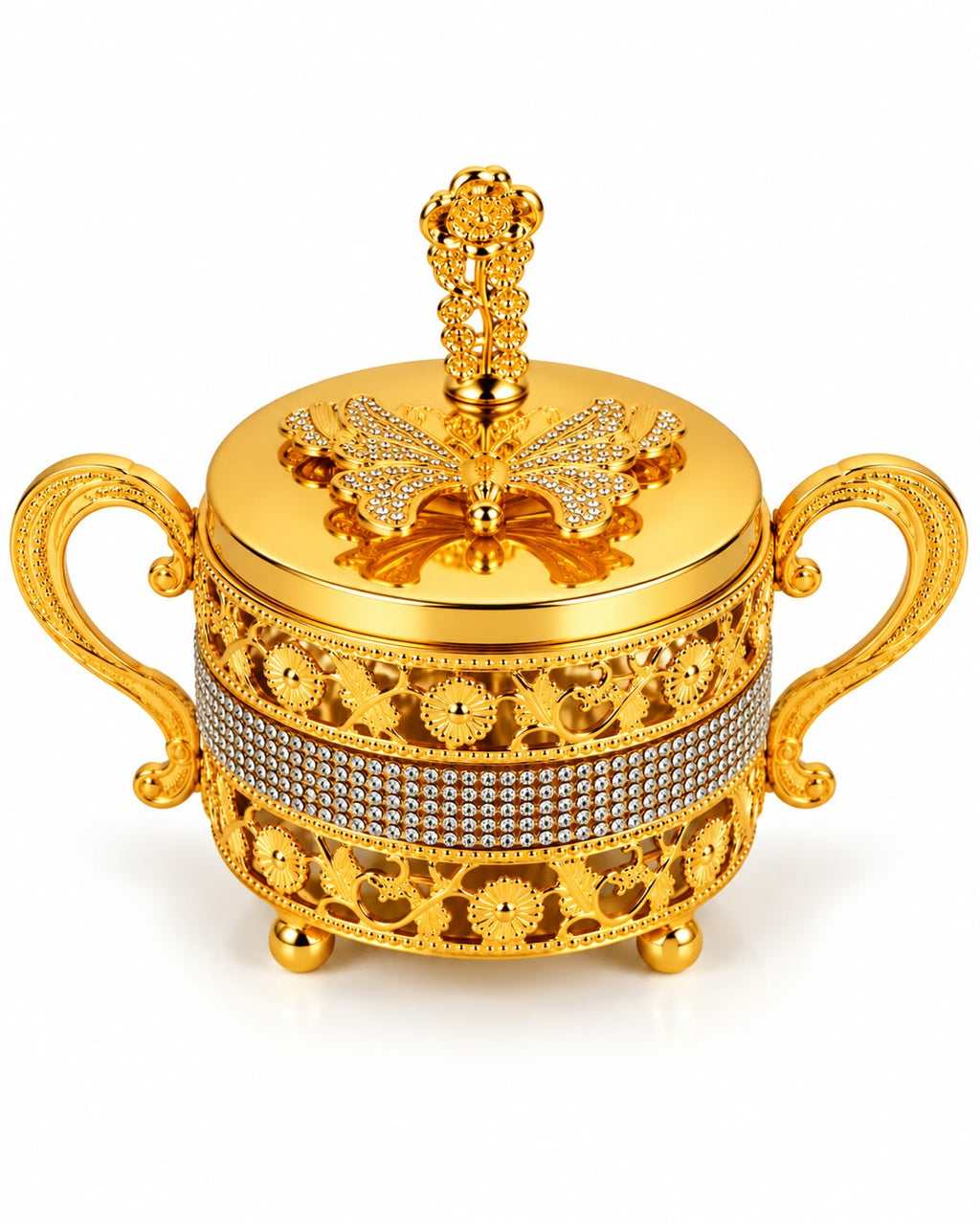 Ornate gold sugar bowl with lid and decorative handles on white background