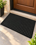 Square grid textured doormat in black and brown