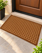 Square grid textured doormat in black and brown