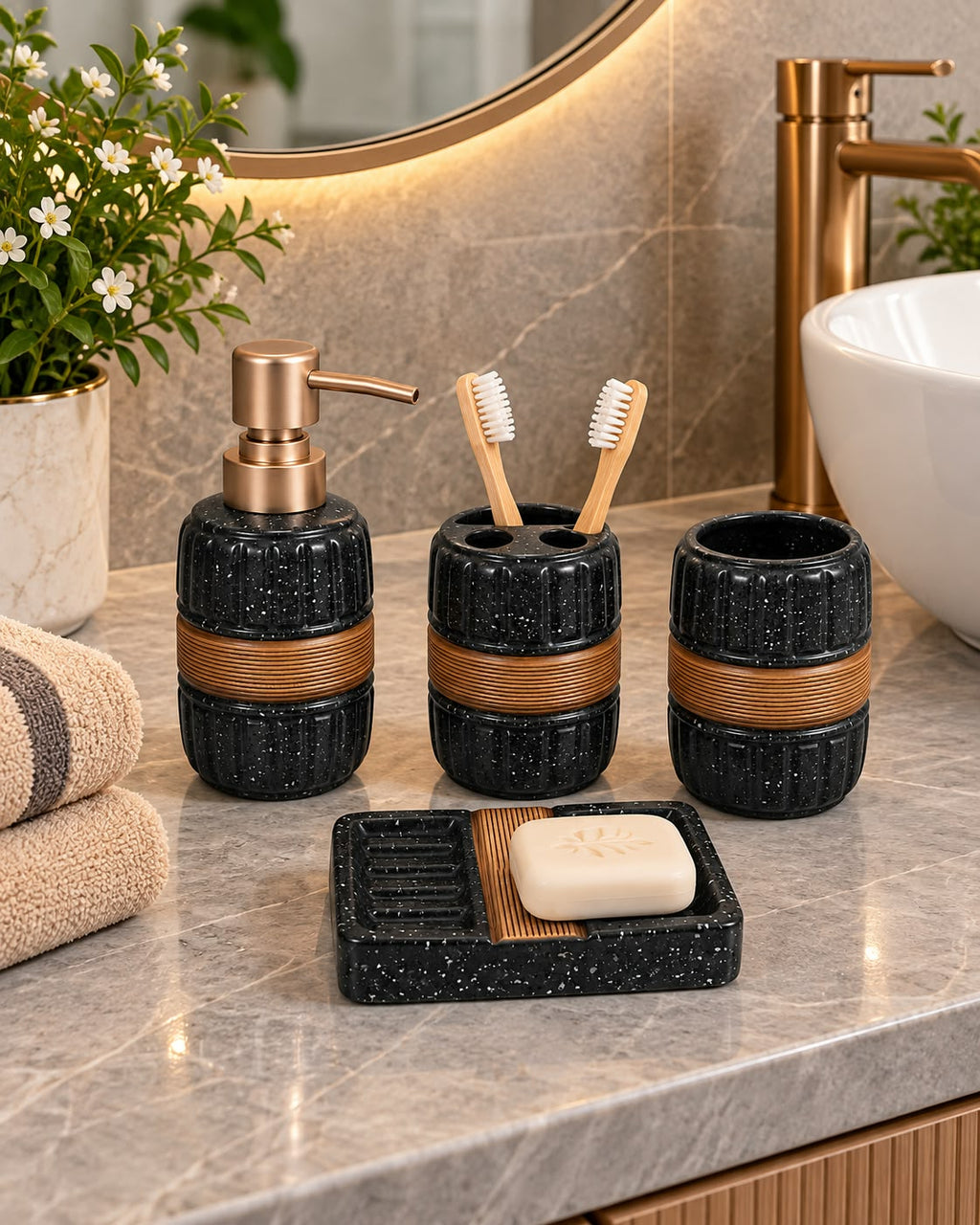 Speckled four piece gold-accent bathroom set