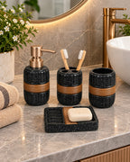 Speckled four piece gold-accent bathroom set