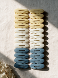 24-piece ribbed laundry clothes peg set arranged in a lifestyle scene