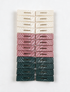 24-piece wave-texture laundry clothes peg set on white background