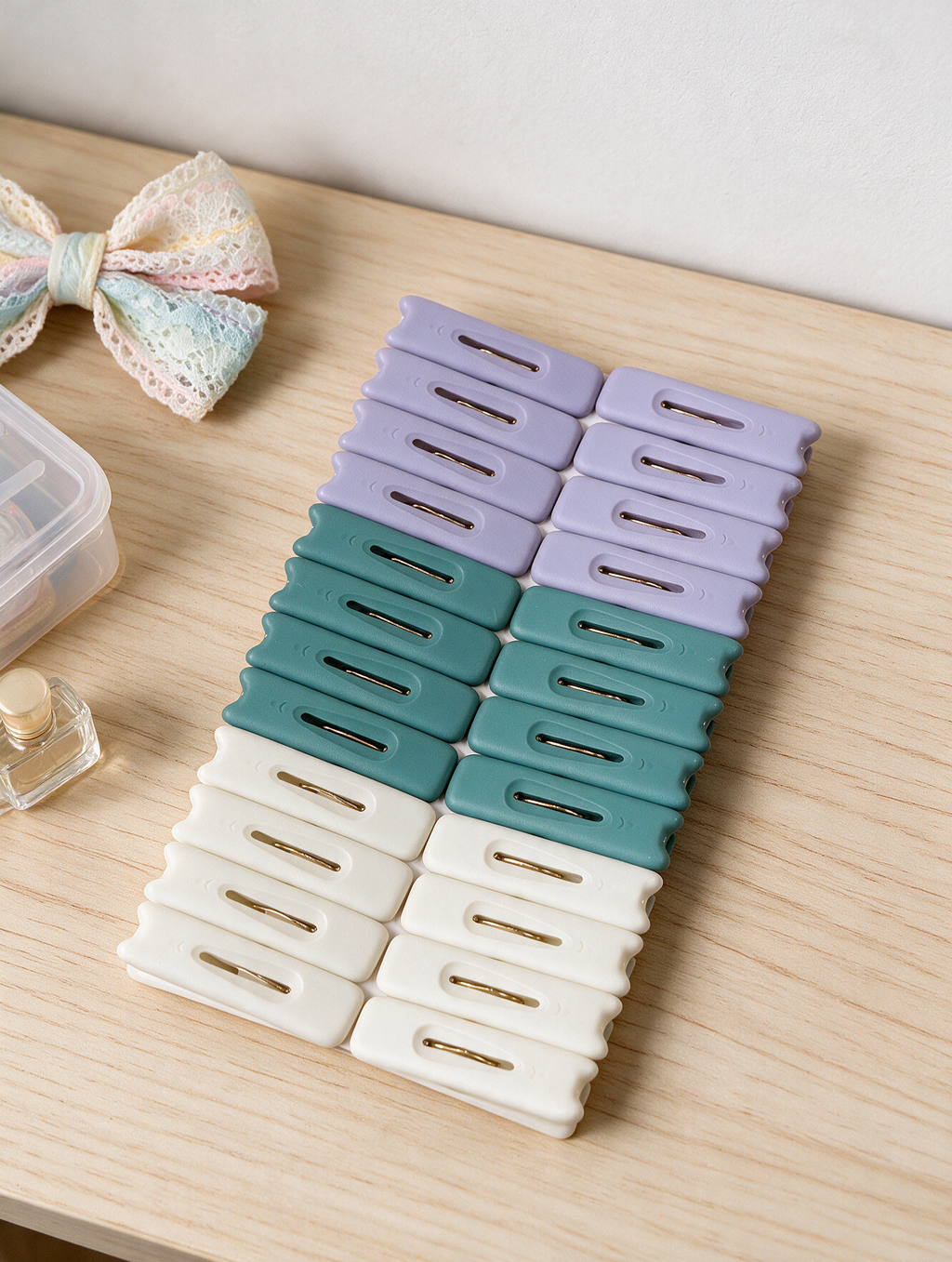 Assorted laundry clothes pegs arranged on a wooden surface