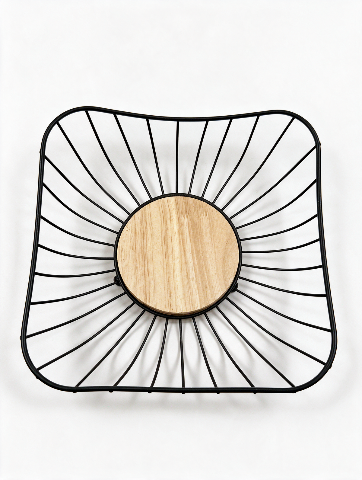 Top view of black metal fruit basket with wooden center
