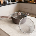Vallena 3-piece potato frying set with a brown non-stick pot, glass lid, and stainless steel strainer basket.