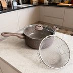 Vallena 3-piece potato frying set with a brown non-stick pot, glass lid, and stainless steel strainer basket.