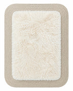 Rectangular furry rug in ivory on white background
