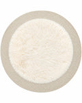 Round furry area rug in ivory on white background