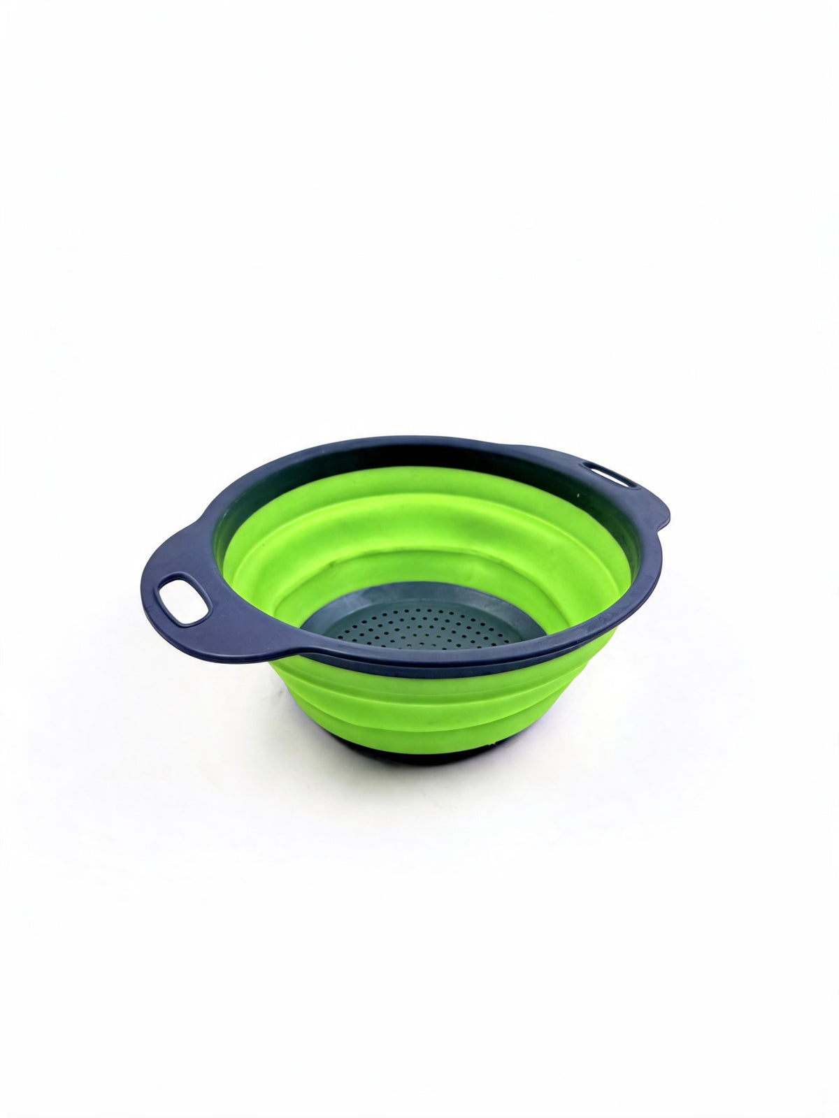 Small collapsible silicone colander in green on white background