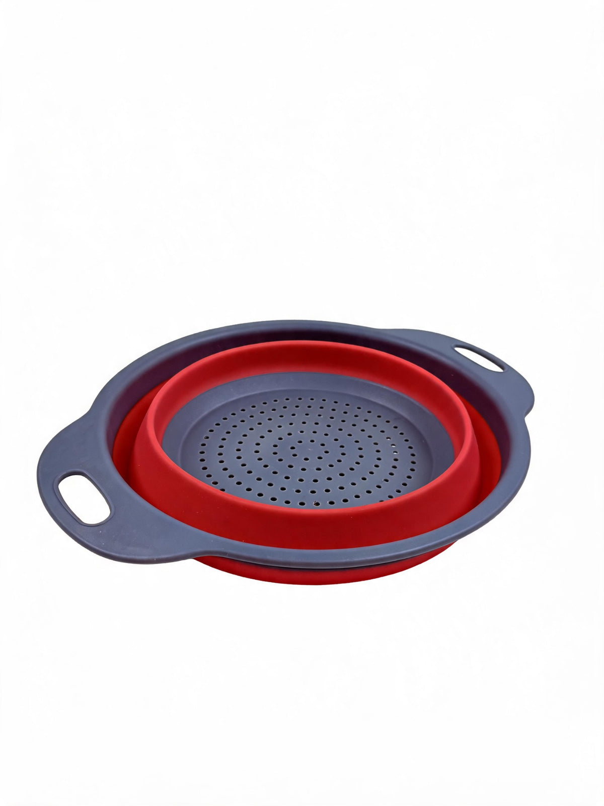 Small collapsible silicone colander in red on white background