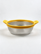 Stainless steel colander with yellow handles and rim on white background