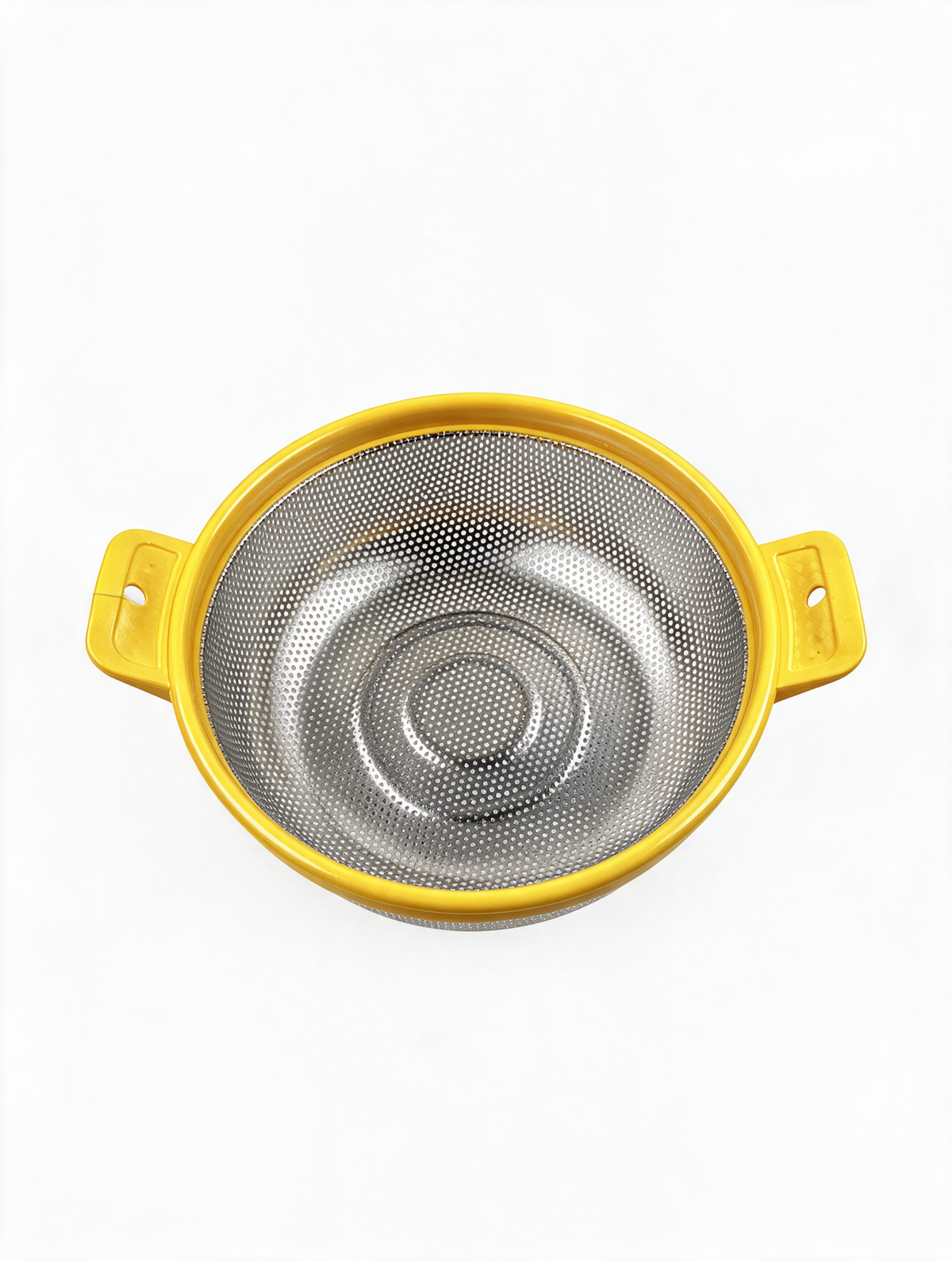 Top view of stainless steel colander with yellow handles and rim