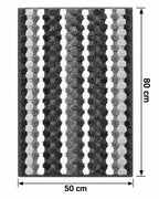 Striped textured bath mat measuring 80 x 50 cm