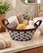 Woven storage basket with towels and bathroom essentials
